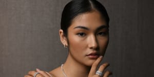 Model Kristena Seedwell wears a selection of Michael Hill’s new range of lab-grown diamond jewellery,including 1.8 carat tennis bracelet ($2,659) and 3.5 carat emerald-cut eternity ring ($7,999),at the company’s head office in Brisbane.