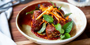 Salt-and-pepper pork ribs with chilli and basil.