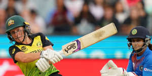 On the charge:Australian opener Alyssa Healy on her way to a rapidfire 75 off 39 balls.