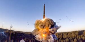 A rocket launches from a missile system as part of a ground-based intercontinental ballistic missile test at the Plesetsk facility in north-western Russia.