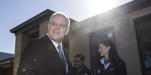 Prime Minister Scott Morrison visiting a first home buyer’s house nearing completion and some young adults who are saving to buy their first house in Morphettville in Adelaide.