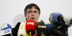 Former Catalan leader Carles Puigdemont attends a news conference in Berlin,Germany,on Tuesday. His pro-independence colleagues are on trial.