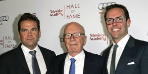 News Corp. executive chairman Rupert Murdoch,center,and his sons,Lachlan,left,and James Murdoch .