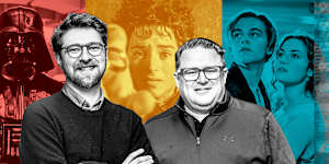 Dan Golding,left,and Andrew Pogson from Art of the Score with images from Star Wars,The Lord of the Rings and Titanic.