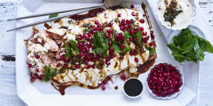 This salmon topped with tahini sauce,walnuts,mint and pomegranate is great warm or cold.