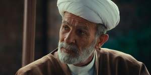Kamel El Basha as Sheikh Mohammad in House of Gods.