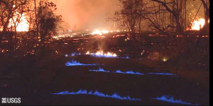 'Eerie'blue flames burn near Hawaii's Kilauea volcano