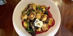 Gnocchi with beetroot puree,goat cheese,pistachios and field mushrooms.