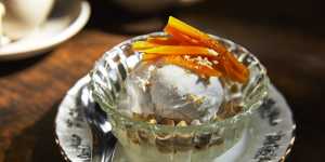 Coconut ice-cream with peanuts,candied pumpkin and palm seeds.