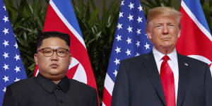 Paternal pride? North Korean leader Kim Jong-un,left,with Trump in 2018. Trump dubbed him “Little Rocket Man”.