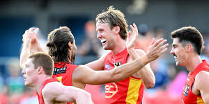 Jack Lukosius celebrates one of his five goals for the Suns.
