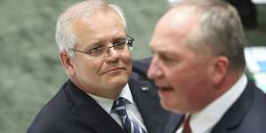 Prime Minister Scott Morrison watches Deputy Prime Minister Barnaby Joyce during Question Time.