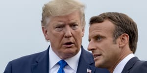 French President Emmanuel Macron,right,said the US under President Donald Trump appeared to be"turning its back on us".