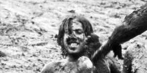 Mudsliders John Akers,18 at the time,of Frankston bears down on Brian Carson of Bonbeach in January 1975. Robert Gray. 