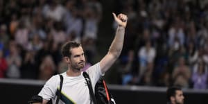 Andy Murray waves as he leaves Margaret Court Arena after his third-round loss to Roberto Bautista Agut.