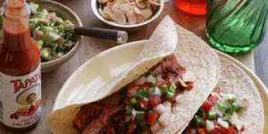 Soft tacos with smoky shredded pork.