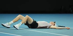 Jannik Sinner of Italy collapses after winning championship point in the Australian Open mens’ final.