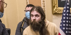 Jake Angeli,on the right,known as the Q Shaman,quickly became the face of the Capitol riots,striking poses even on the dais of the senate. On September 3,Angeli pleaded guilty to a single count of obstructing a congressional proceeding and was sentenced to 41 to 51 months in prison.