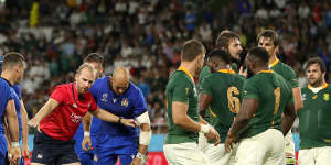 South Africa's Duane Vermeulen goes down injured after a dangerous tackle by Andrea Lovotti that led to his send-off.