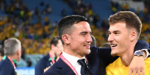 Tim Cahill celebrates Australia’s win over Denmark with Ajdin Hrustic.