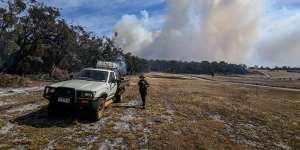 Three homes destroyed as massive bushfire continues to burn