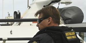 Australian Border Force (ABF) marine tactical officer Michael Kingston on a fast response boat patrolling off Thursday Island. The ABF has increased their presence in the Torres Strait as a part of Operation Overarch that was designed to protect the Torres Strait protected zone. Torres Strait Treaty normally allows people to travel freely back and forth between the Torres Strait and PNG Treaty villages but this has been suspended due to the COVID-19 threat and both countries closing their borders. Daily life Saibai island,vaccination,Australian Border Force,Operation Overarch. Climate Change. Thursday Island,Torres Strait. 2nd June,2021. Photo:Kate Geraghty 