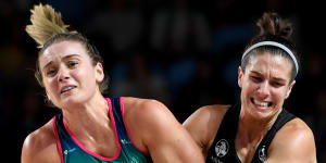 The Magpies'Ashleigh Brazill (right) clashes with the Vixens'Liz Watson.
