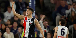First-gamer Anthony Caminiti celebrates as St Kilda storm to a win over Fremantle at Marvel Stadium.