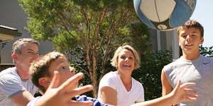 Kristina Keneally playing basketball with husband,Ben and sons,Daniel (12) and Brendan (10,blue shirt) at their Pagewood home in 2011.