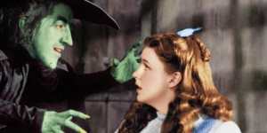 Judy Garland as Dorothy,with Margaret Hamilton as the Wicked Witch of the West.