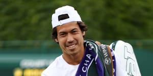 Jason Kubler celebrates after winning match point against Dennis Novak of Austria.