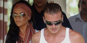 David and Victoria Beckham visit Thailand in 2003.