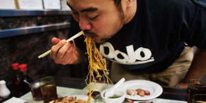 Chang at one of his favourite New York City eateries,Great NY Noodletown restaurant.