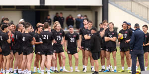 AFL Academy coach Tarkyn Lockyer addresses the Vic Metro squad on Monday.