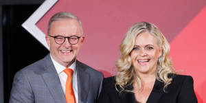 Anthony Albanese presents Taryn Brumfitt with the 2023 Australian of the Year award in Canberra in January.