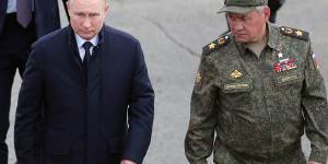 Russian President Vladimir Putin,left,and Russian Defence Minister Sergei Shoigu attend a joint strategic exercise at a training ground in the Nizhny Novgorod region.