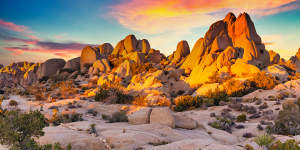 Rocks in Joshua Tree National Park illuminated by sunset,Mojave Desert,California.