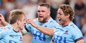 Max Jorgensen (left) celebrates with Waratahs teammates after scoring on debut against the Brumbies,but he joins the side’s long injury list.