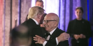 Rupert Murdoch and then US president Donald Trump embrace at a function in 2017.