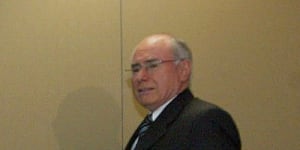 John Howard releasing the Flood inquiry report,22 July 2004. Philip Flood wrote:“Australia shared in the allied intelligence failure on the key question of Iraq WMD stockpiles.”