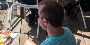 The deck at Beach House gazes over the sands and bathing boxes of Brighton Beach.