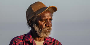 Aurukun artist Keith Wikmunea has won the top prize at the National Aboriginal and Torres Strait Islander Art Awards.