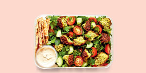 It's easy to make your own pita chips for this falafel salad.