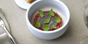 Go-to dish:Yellowfin tuna with oxheart tomato,burrata and basil.