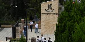 Students entering Newington College,which will soon accept female students.