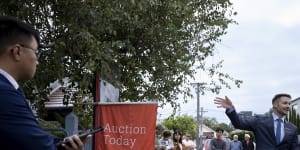 Nelson Alexander auctioneer James Pilliner calls for bids during the auction.