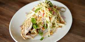 Whole fried snapper with apple salad.