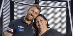 Essendon skipper Dyson Heppell with Bobbie Lee Blay,a constant presence throughout his footy career.