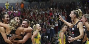 New Zealand players celebrate after winning the Netball World Cup final.