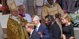 The family of Carlo Acutis attend the canonisation mass celebrated by Pope Leo XIV,left.